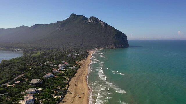 The beach of Sabaudia, the lake of Paola and the profile of the sorceress Circe.
The famous beach of Sabaudia with its luxurious villas on the sea. Aerial view.