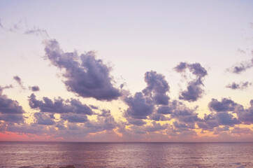 Fototapeta na wymiar Beautiful Sunrise over the Sea .Sea Landscape with Cloudy Purple Sky