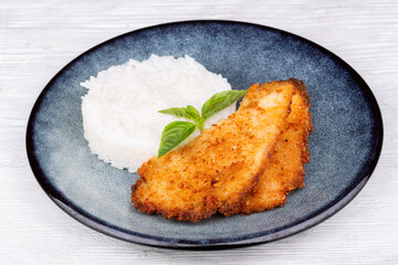 turkey schnitzel with cheese and rice