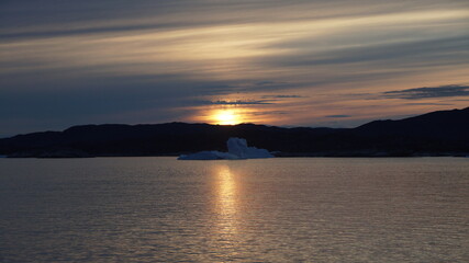 iceberg in the sea in the sunset, Ilulissat Icefjord, Illulissat, Greenland