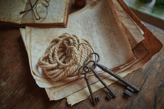 Rope, keys and a manuscript. Preparation of equipment for the discoverer, traveler.