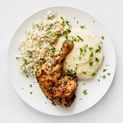 chicken leg with potato and salad