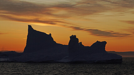 iceberg in the sea in the sunset, Ilulissat Icefjord, Illulissat, Greenland