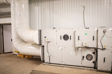 ventilation pipes in the warehouse. communications for the circulation of fresh air in industrial...