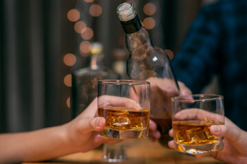 Celebrate whiskey on a friendly party in  restaurant.