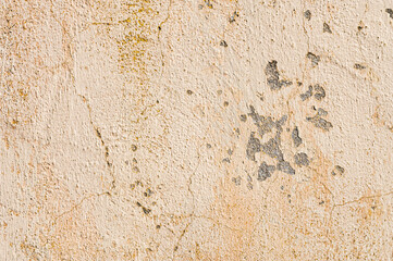 Old painted cracked wall with peeling paint. Grunge background. Expressive texture