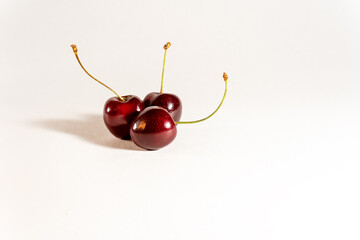 Obraz na płótnie Canvas Ripe cherries three berries