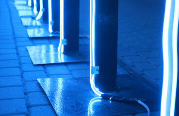 Blue led neon flexible strip light illuminated in dark light.