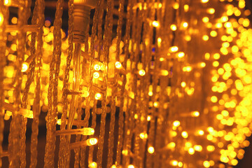 Christmas led blinking strip light blurred bokeh illuminated background.