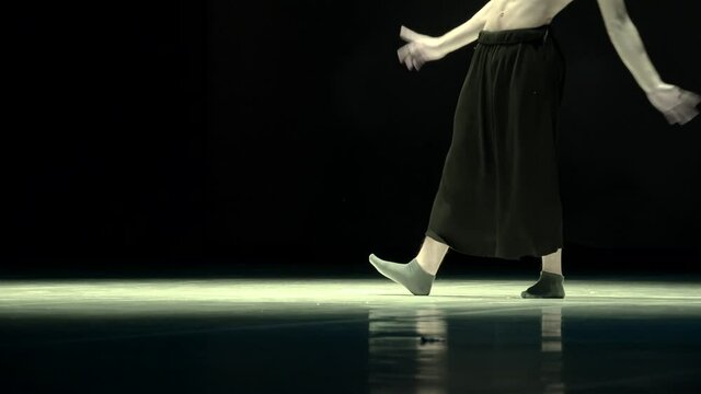 Feet of the male danser during the modern dance.