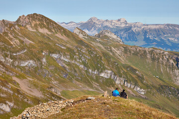 Couple sitting near summit of the Alvier