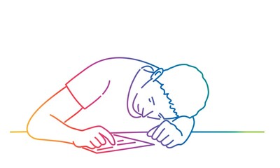 Bored man, tired and exhausted student sits with his head on the table.