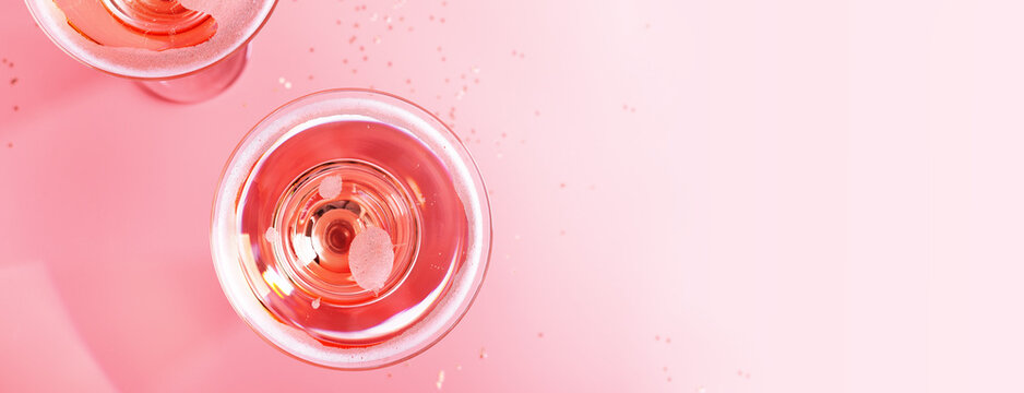 Sparkling Wine In Coupe Glass, Rose Wine On Monochrome Pink Background