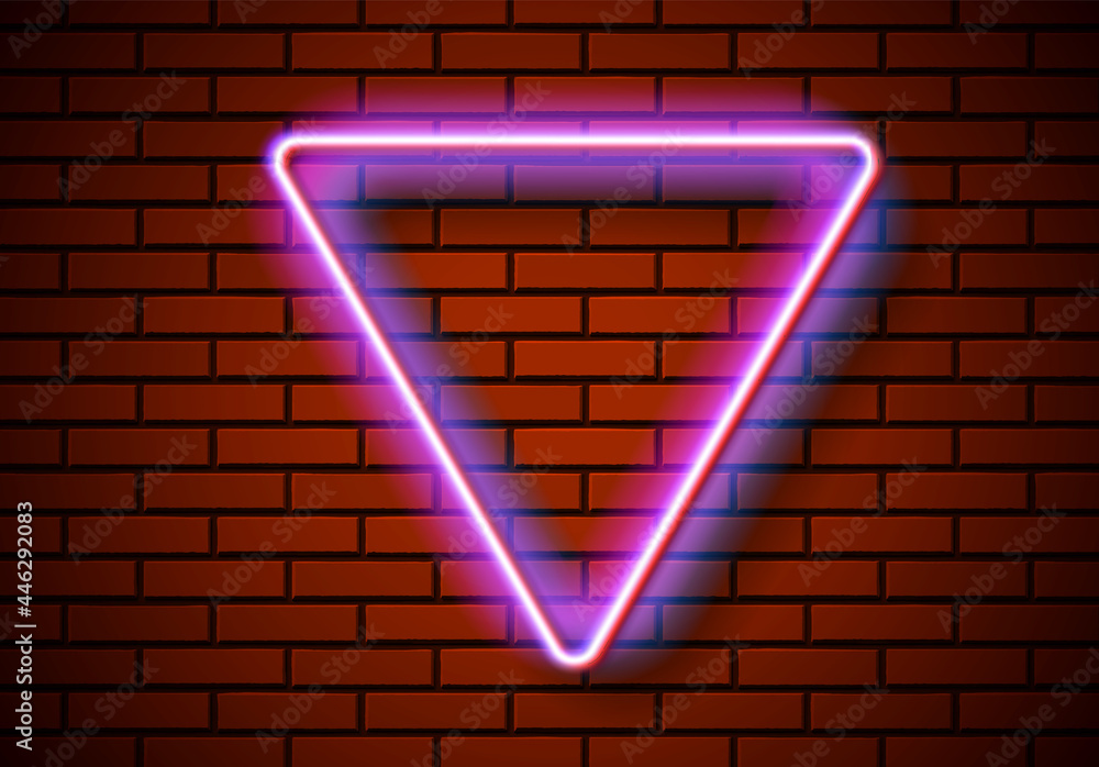 Poster neon frame with triangle shape on the red brick wall. classic rectangular 80s styled shiny glowing n