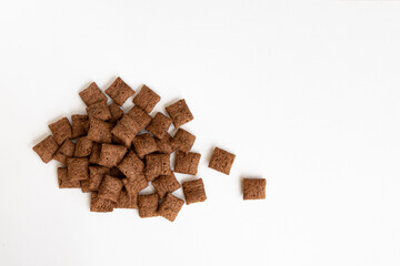 chocolate corn pads isolated on white background, cereals breakfast