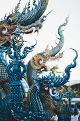Fototapeta na wymiar Blue Temple Wat Rong Suea Ten in Chiang Rai.