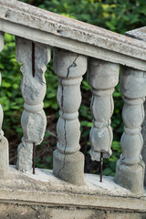 Destroyed old baluster railing by the stairs