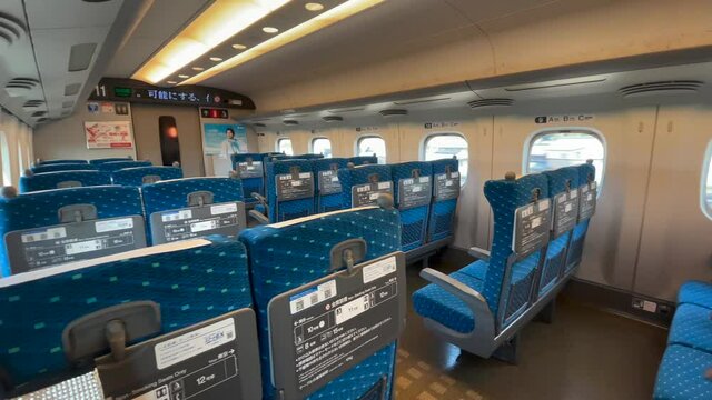 JAPAN - APRIL 2021 : View inside empty Bullet Train (Shinkansen). No people on train, due to concerns over Coronavirus (COVID-19), State of emergency. Tokyo - Osaka line.