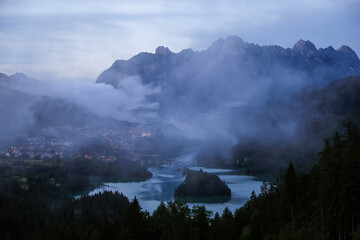 View of lake in Pieve di Cadore after rain with fog