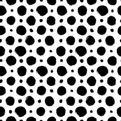 Abstract seamless pattern with circles. Geometry black and white vector pattern for fabric. Textile grunge background. Hand drawn polka dot texture. Modern graphic design with different circles.