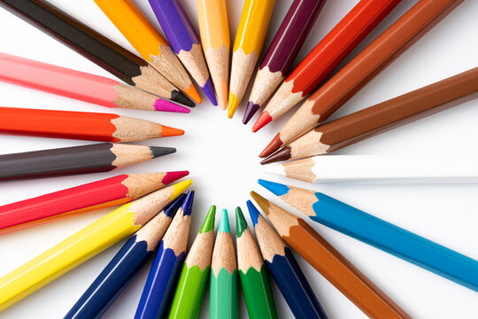 Colorful pencils in circle on white background. Education concept and back to school concept.Top view
