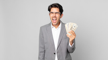 young hispanic man shouting aggressively, looking very angry