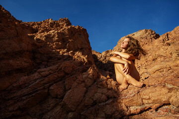 Naked woman in the desert