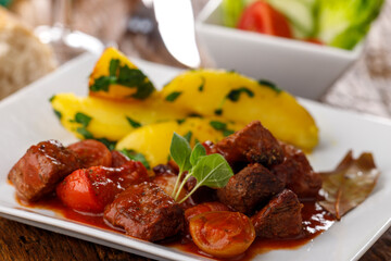 greek stifado meat stew with potatoes