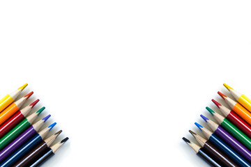 Colored pencils on a white isolated background. School supplies