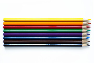 Fototapeta premium Colored pencils on a white isolated background. School supplies
