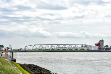 View of the Nieuwe Waterweg in Hoek van Holland, with the imposing Maeslant storm surge barrier, being one of the most complex parts of the Delta Works. Netherlands, Holland, Europe