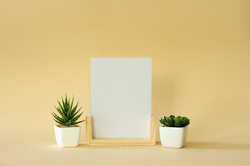 A sheet of paper with a blank space and decorative mini flowers on a delicate background