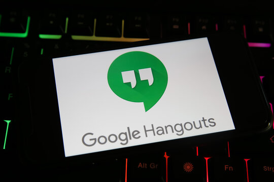 Viersen, Germany - June 1. 2021: Closeup of phone screen with logo lettering of google hangouts on computer keyboard