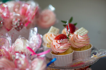 festive candy bar with cake and sweets