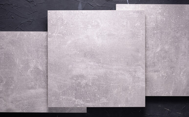 Abstract grey background texture at table or wall. Picture frame at black wall background