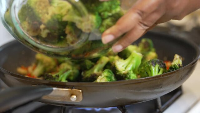 Broccoli poured into a pan