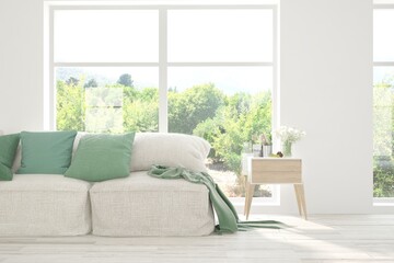 White living room with sofa and summer landscape in window. Scandinavian interior design. 3D illustration