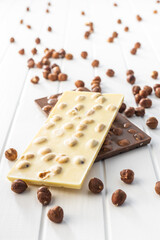 White and dark chocolate bar with hazelnuts.