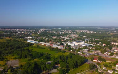 Deurstickers Aerial view of a small green city on a summer day © Payllik