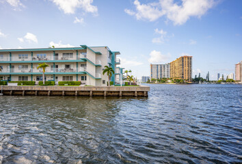 Miami Condos on the water with deteriorating seawall - obrazy, fototapety, plakaty