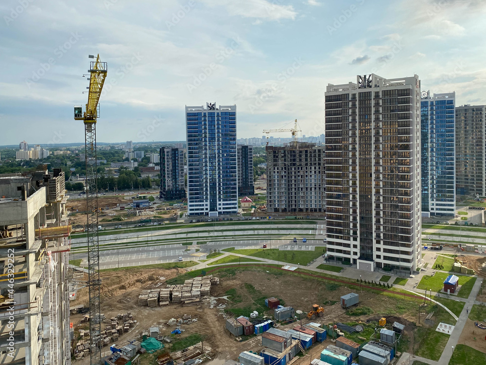 Aufkleber a view from a height of a large modern construction site of tall large houses and multi-storey build