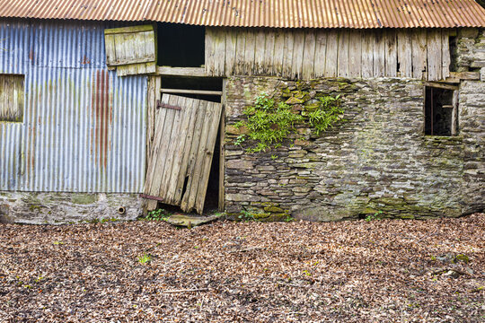 A rather sad, delapidated barn in Exmoor National Park at Hawkridge, Somerset UK
