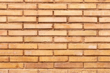 Earthy colored brick wall, rustic, industrial