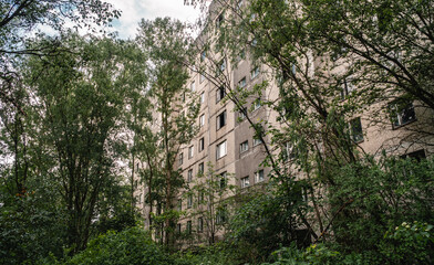 Fototapeta na wymiar Abandoned Soviet-style apartment block in Pripyat inside the Chernobyl Exclusion Zone, Ukraine