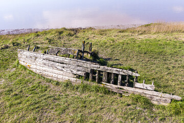 The remains of The Severn Collier, one of many such vessels deliberately beached on the banks of...