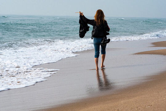 cleaning trash on the beach voluntarily