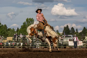 Fotobehang Bronc Rider at Rodeo © Carrie