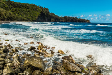 Large Rocks Covering The Black Sand Pololu Beach in Pololu Valley, Hawaii Island, Hawaii, USA