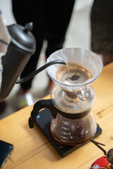 Making process of V60 coffee, filter coffee, pouring hot water on the coffee