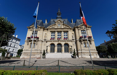 Fototapeta na wymiar Suresnes town hall . It is municipality of the department Hauts-de-Seine in the region Ile-de-France.